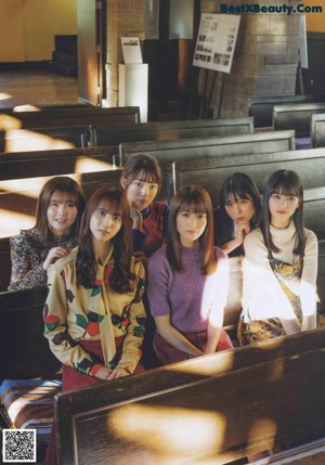 A group of girls standing next to each other in a magazine.